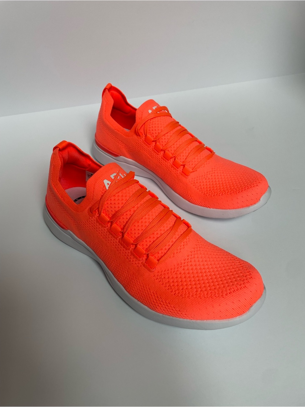 NWOT APL Women's Neon Coral Knit Lace-Up Sneakers